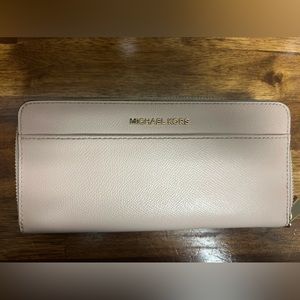 Michael Kors pink zip around wallet